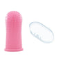 Pink silicone brush with clear cover on a white background