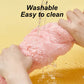 Pink fluffy toy being washed with water, text 'Washable Easy to clean' on a yellow background