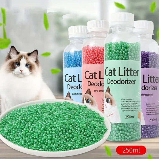 Cat litter deodorizer bottles with a cat and green beads on a light background
