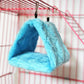 Blue fleece pet hammock hanging inside a cage