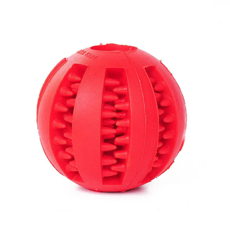 Red rubber ball with textured surface on a white background