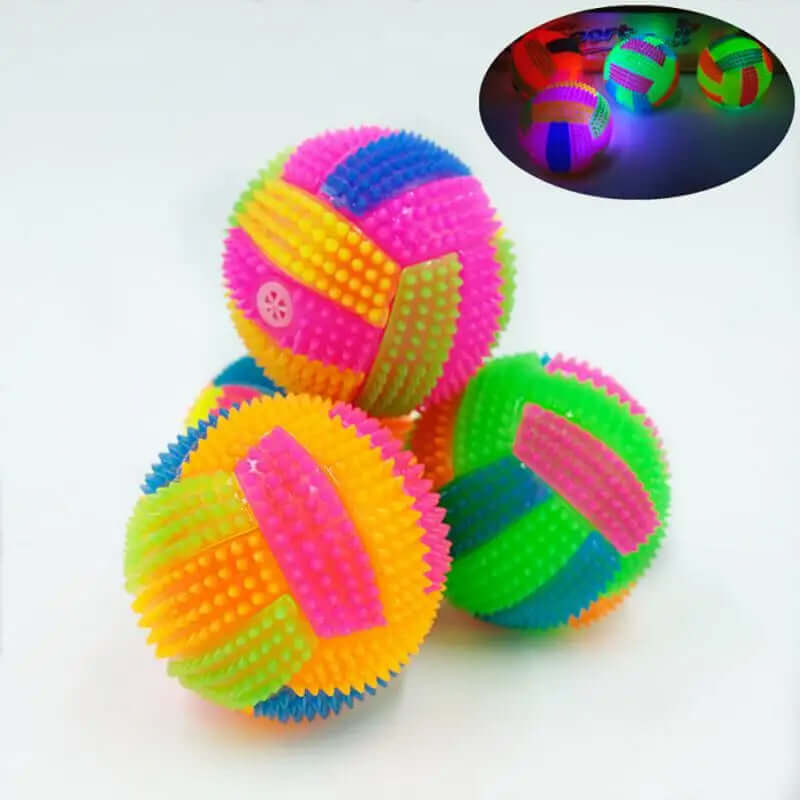 Colorful textured balls on a white background with an inset showing glowing balls.