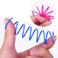 Hand holding a blue spring with a pink spiral, on a white background