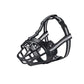 Black dog muzzle with gray straps on a white background