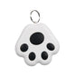 White paw-shaped keychain with black spots on a white background