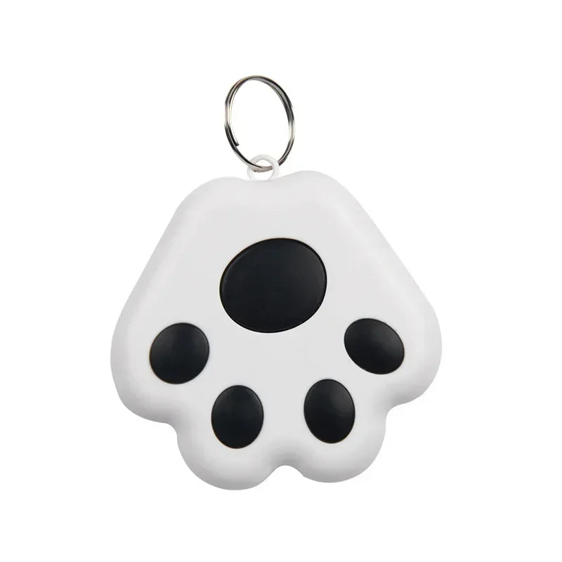 White paw-shaped keychain with black spots on a white background