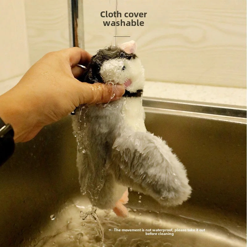 Plush toy being washed in a sink with text indicating it is washable.