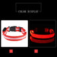 Red and white dog collar with reflective strip on a black background