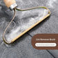 Lint remover brush on a textured surface with text indicating no electricity required and durability.