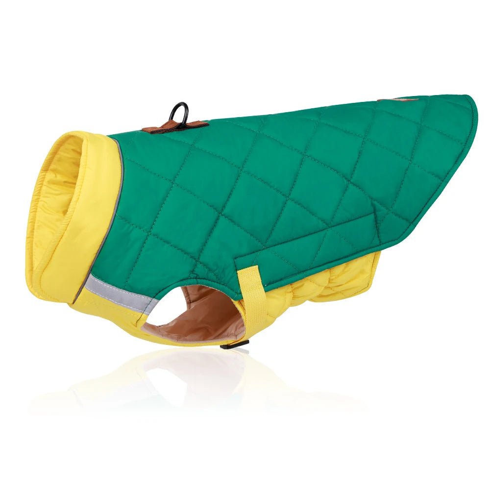 Green and yellow quilted dog coat on a white background